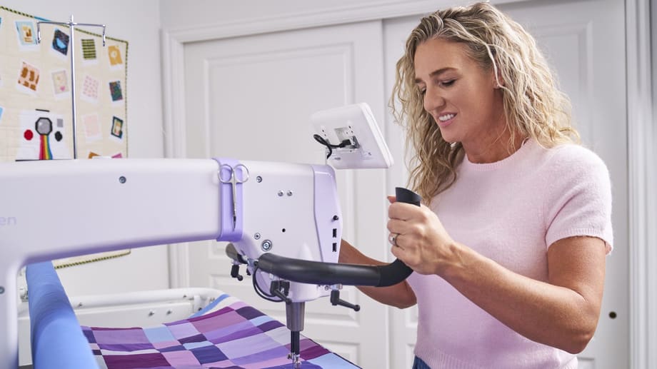 A quilter at the HQ Super Sixteen